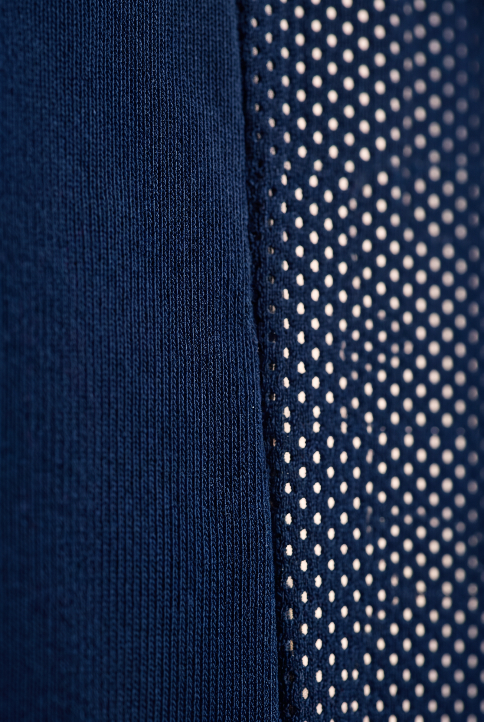 Knit dissolving into backlit mesh